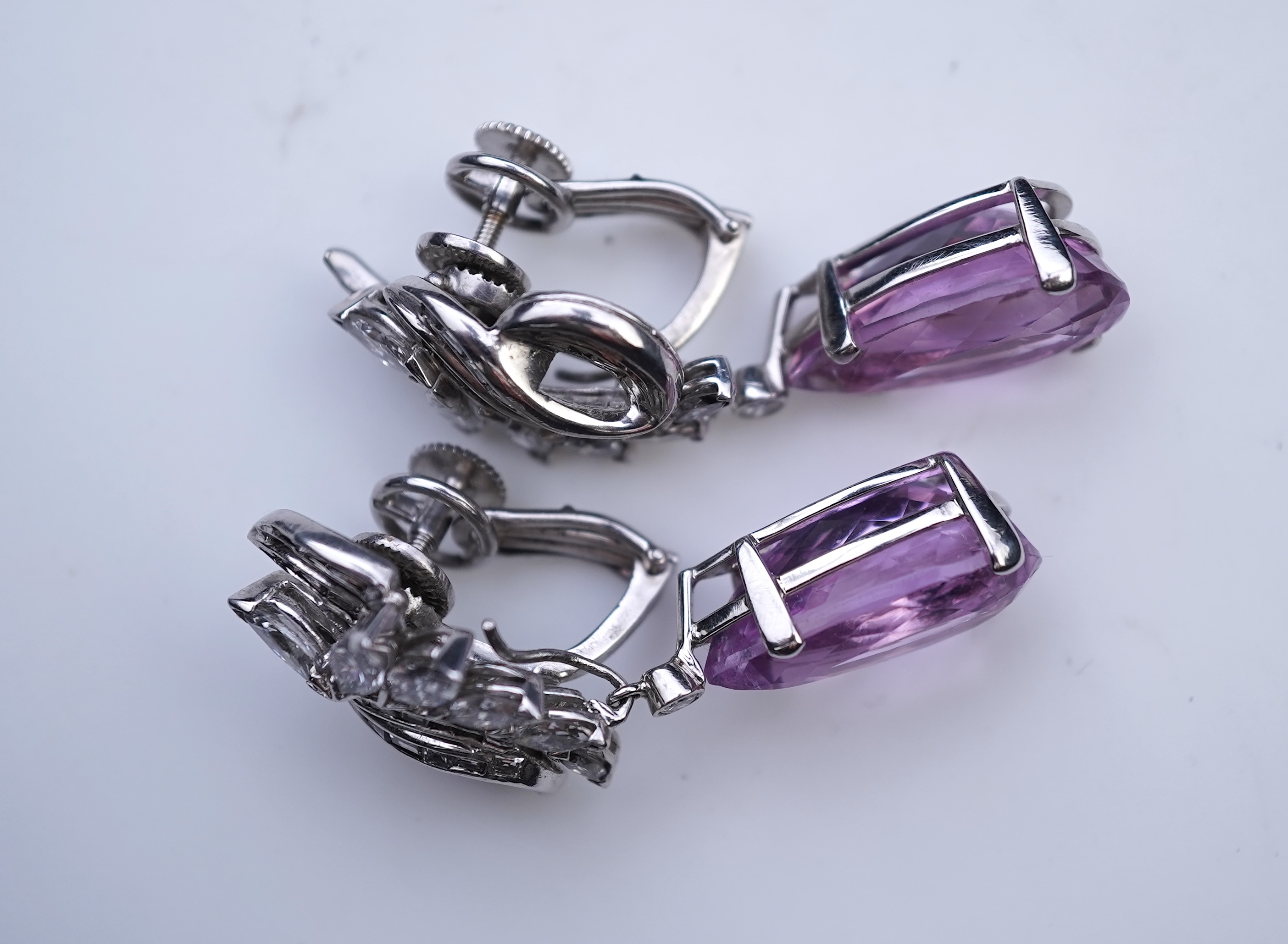 An attractive pair of 'day and night' kunzite and diamond ear clips
